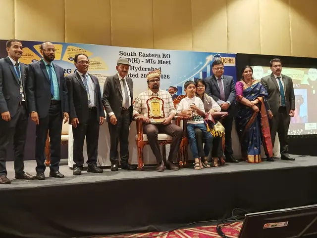 Vijay Arjun V of Hyderabad Home Loans holding an award on stage at the LIC HFL South Eastern Region MIs Meet in Hyderabad, 2026